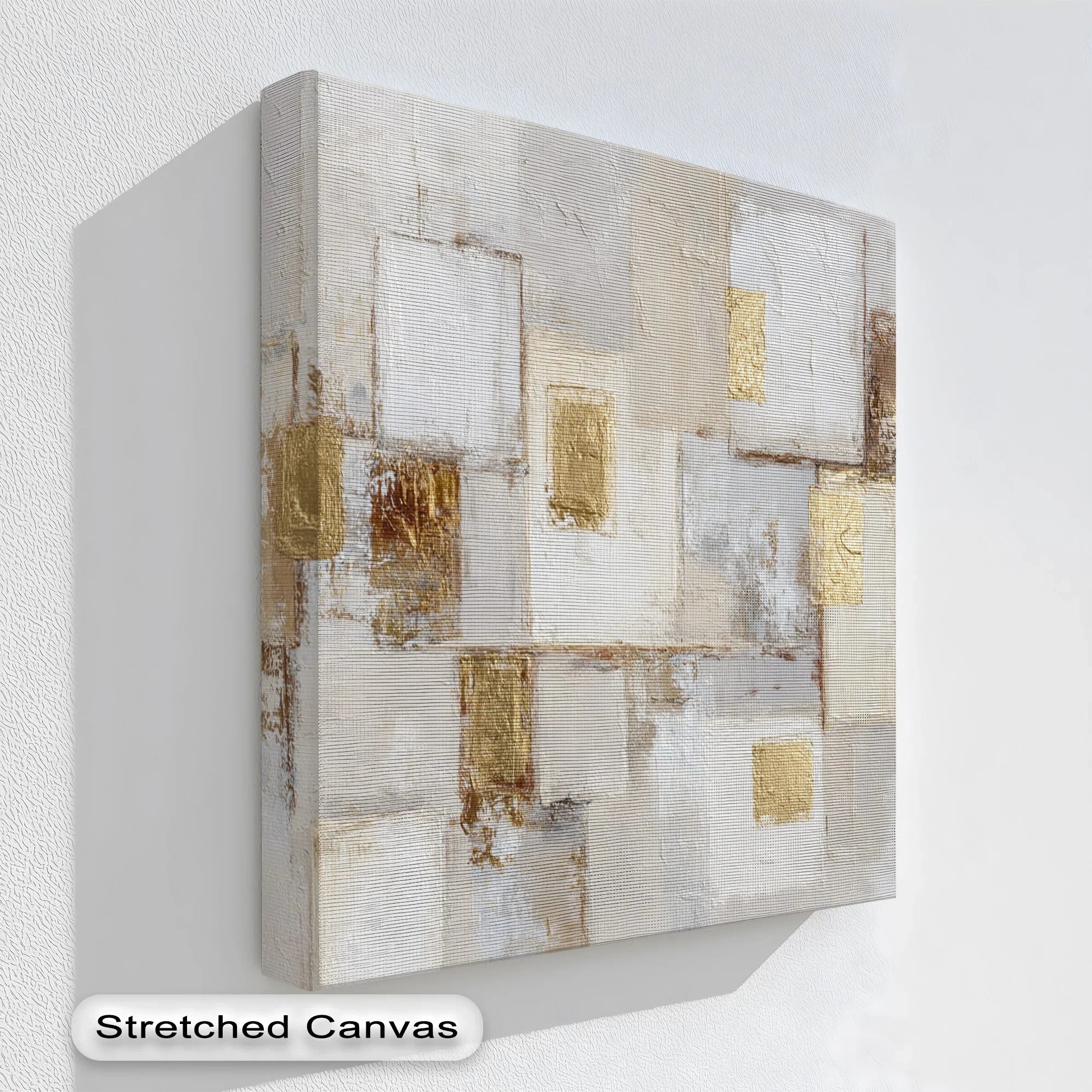 Neutral geometric canvas art with gold leaf accents

