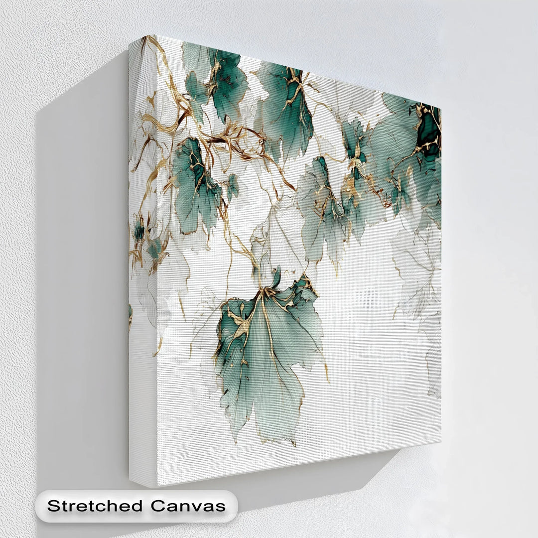 Elegant botanical canvas print with gold accented green leaves on white background

