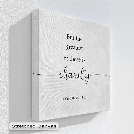 The clean edge and precise borders of this 'The Greatest Is Charity' canvas print exemplify the quality of canvas artwork, presenting a finished and refined product.