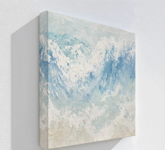 Square canvas painting featuring an abstract ocean wave with soft blue tones and a heavily textured surface, creating a calming, coastal aesthetic.