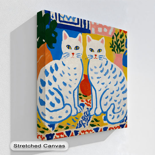 Color transitions highlight the whimsical folk art cats on this vibrant canvas wall decor, blending rich blues and yellows in a playful Scandinavian design.