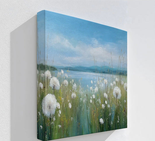 Highlighting the layering effect, this canvas wall art showcases a serene dandelion field and lake scene, creating depth with its vibrant springtime hues.