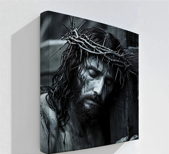 Gradual shades define the dramatic hanging canvas as it depicts the suffering Jesus with the crown of thorns, a poignant study in tonal contrast.