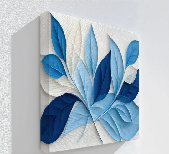 Darkest navy leaf patterns define the shadows in this blue botanical harmony minimalist leaf pattern canvas wall art.