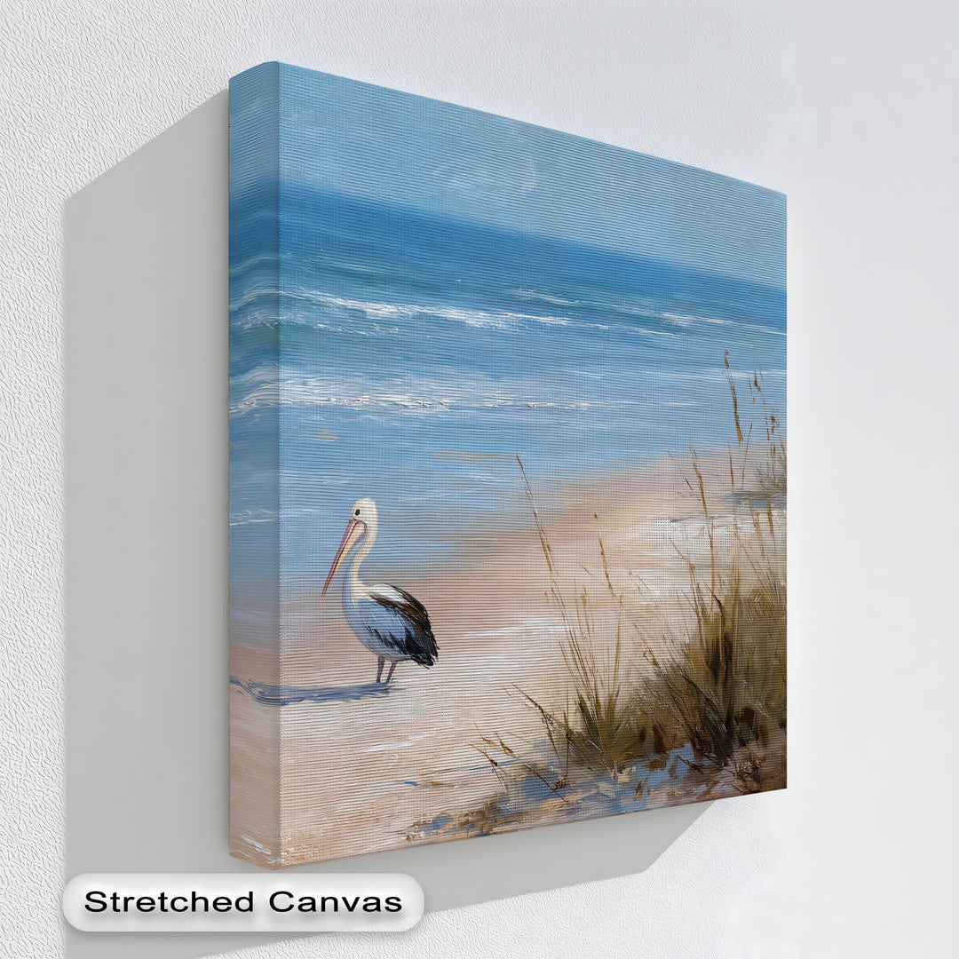 Stretched canvas artwork provides a clean, gallery-worthy finish for this coastal pelican beach canvas print, enhancing the serene ocean and wildlife scene.