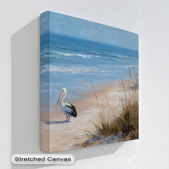 Stretched canvas artwork provides a clean, gallery-worthy finish for this coastal pelican beach canvas print, enhancing the serene ocean and wildlife scene.