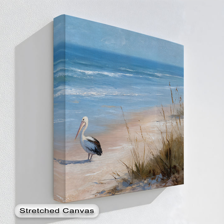 Stretched canvas artwork provides a clean, gallery-worthy finish for this coastal pelican beach canvas print, enhancing the serene ocean and wildlife scene.