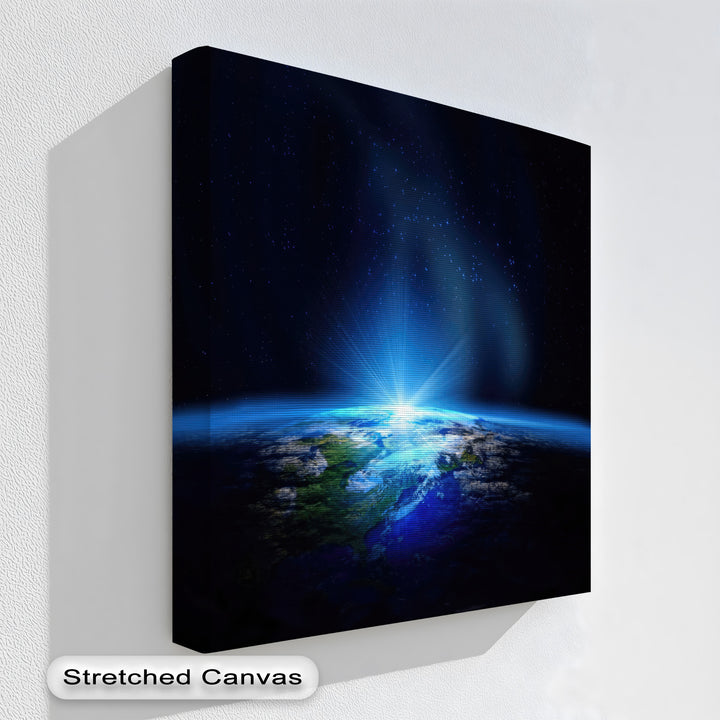 The canvas's finely textured surface, showcasing a radiant Earth framed canvas, contrasts with the surrounding stucco-like wall texture.