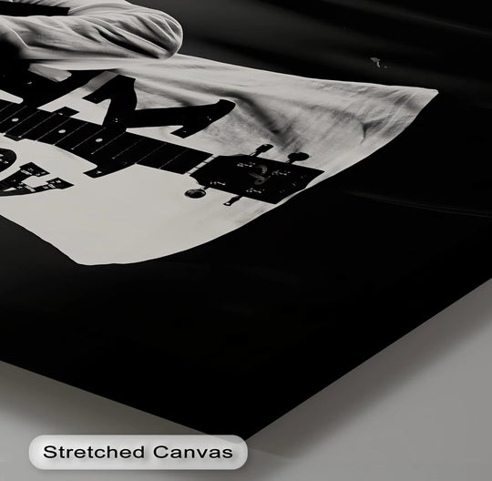 Subtle surface texture enhances the striking monochrome design of this masked identity guitar fusion canvas print, making it a bold piece of hanging canvas art.