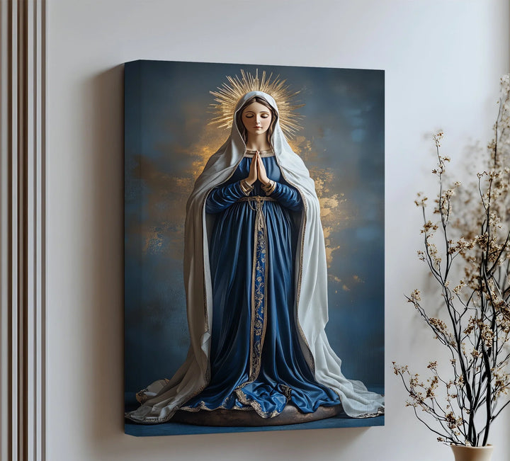 Grace your home with this majestic canvas wall art of the Virgin Mary in radiant blue and gold.

