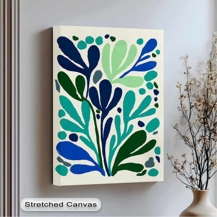 The stillness of the modern blue botanical canvas wall art is captured in the minimalist composition, showing teal and navy abstract leaf shapes.