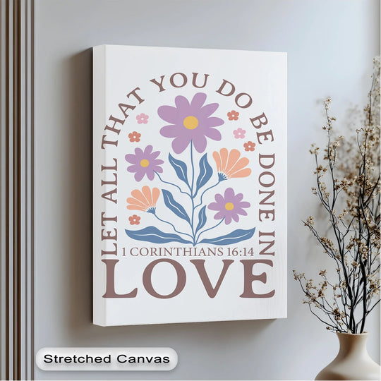 Curving typography and blossoming flowers convey a sense of motion and harmony on this unique canvas print of 1 Corinthians 16:14.