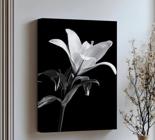 Textured surface of the black and white lily premium canvas decor print highlights the delicate details of the flower's petals.