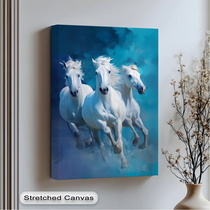 Galloping Spirits – Trio of White Horses in Motion Canvas Print