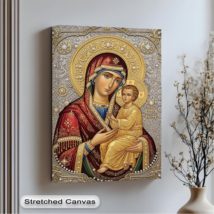 Striking color contrast on this premium canvas decor highlights the Virgin Mary and Child icon with radiant gold and silver against deep red and blue.
