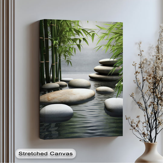 The gallery-wrapped edge and clean borders of this serene bamboo zen framed canvas art feature flowing water and smooth stones.
