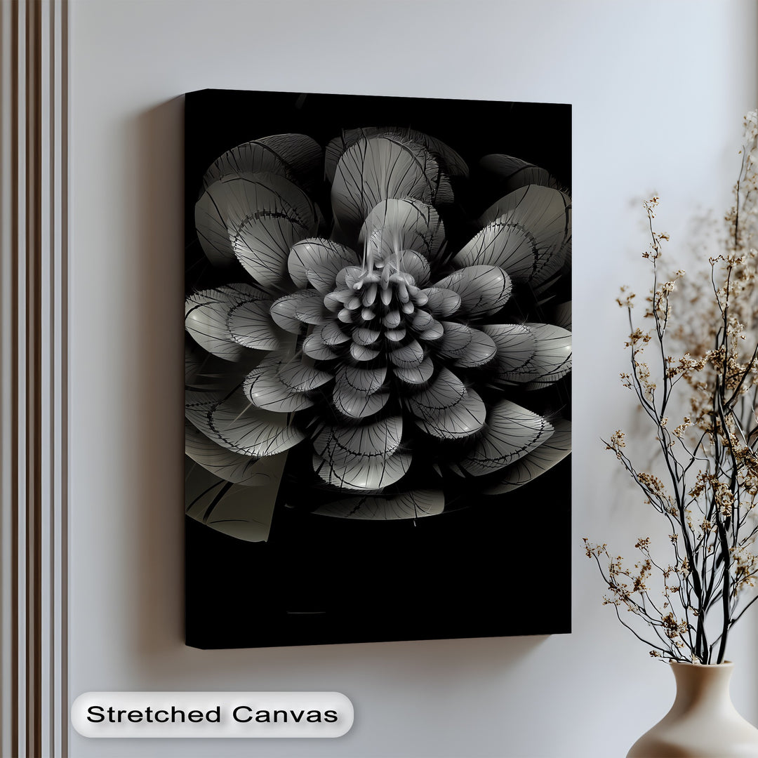 Add sophistication with this monochrome canvas wall art showcasing an abstract metallic bloom.

