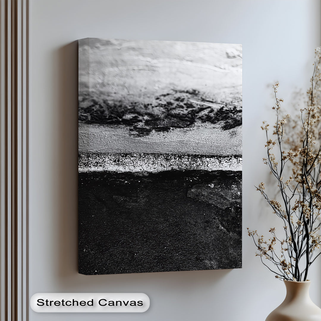 Explore texture and shadow with this minimalist canvas wall art in stark monochrome contrast.

