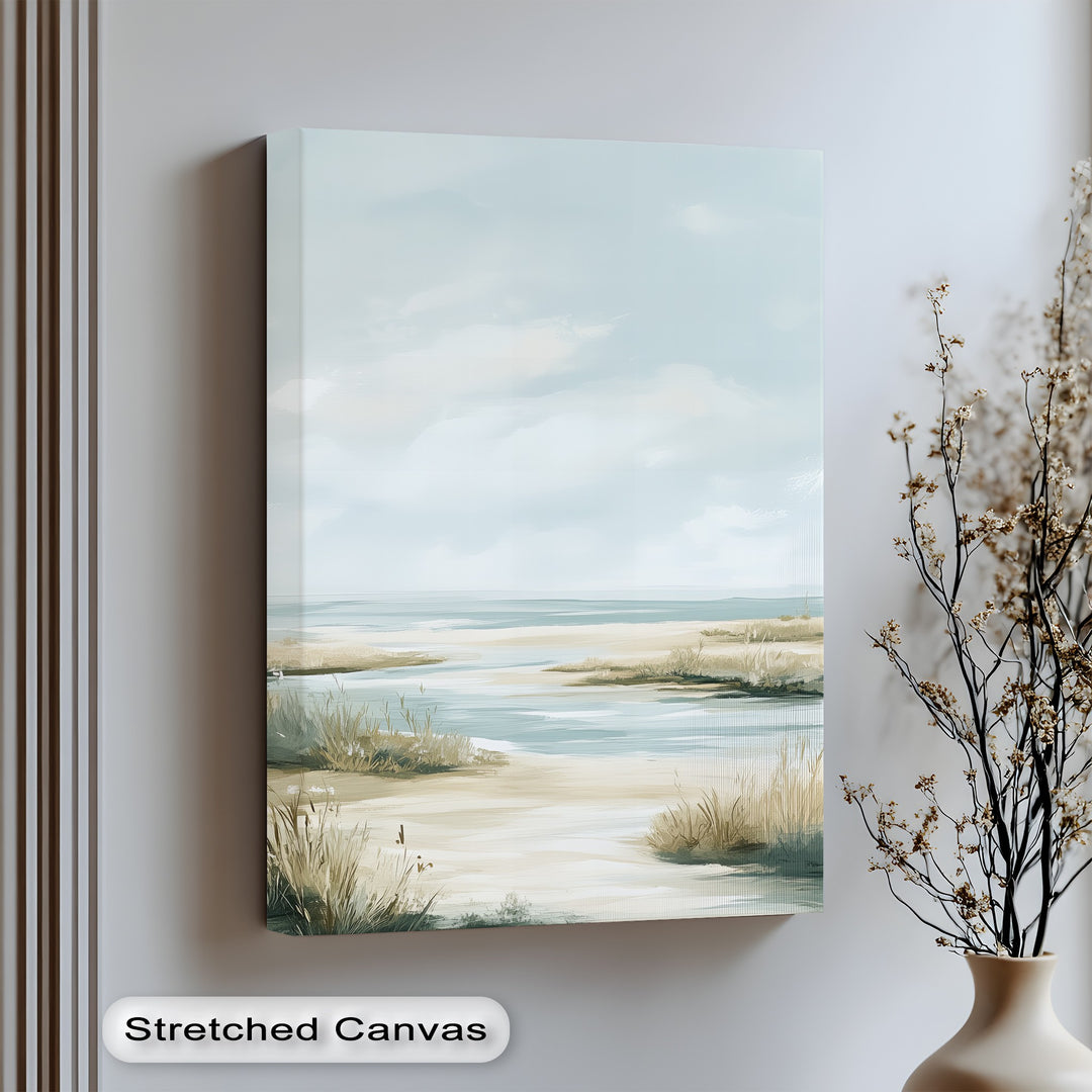 Soft coastal hues bring serenity to your space in this elegant canvas wall art.

