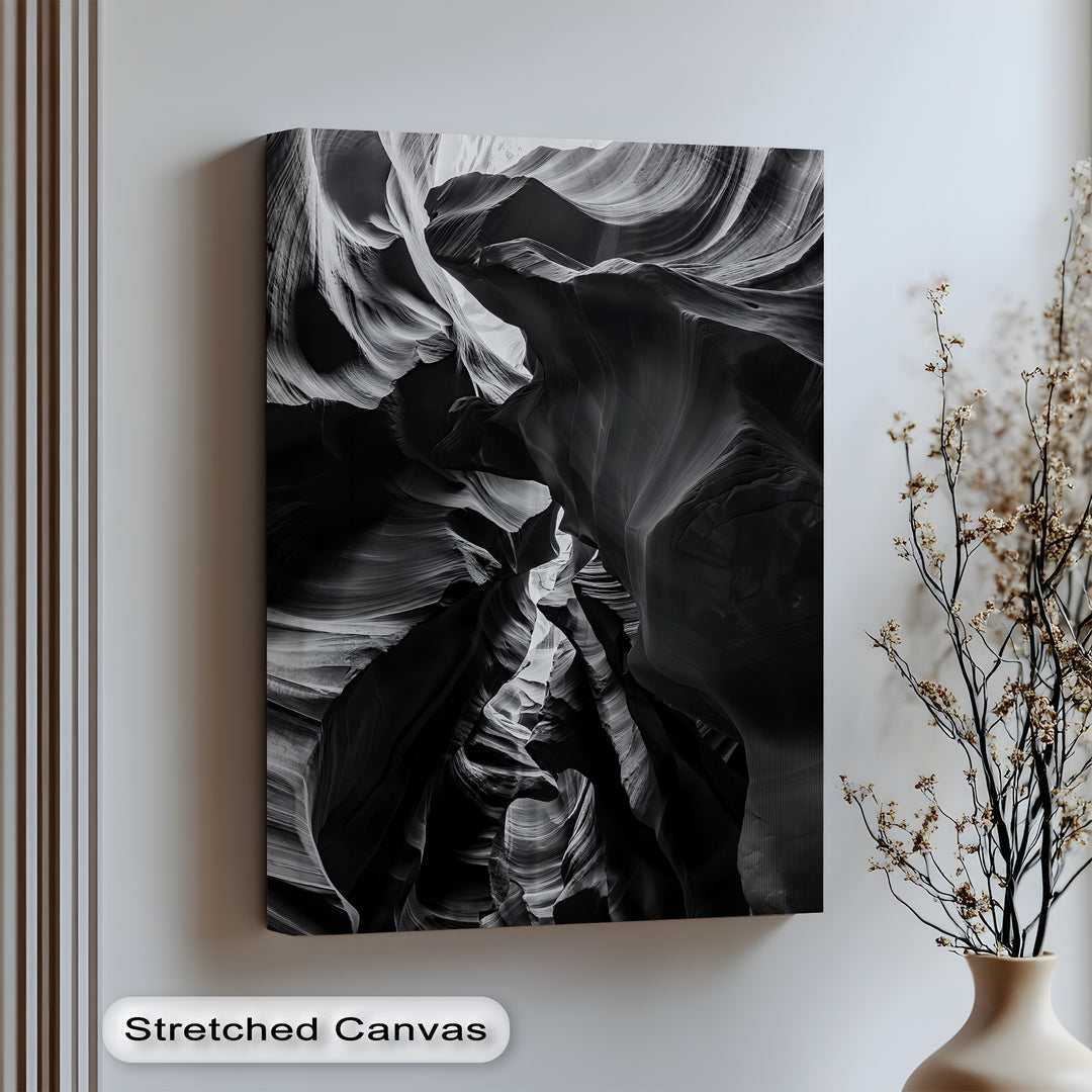 Layered rock shadows swirl in this dramatic canvas wall art, a tribute to nature’s sculptural power.

