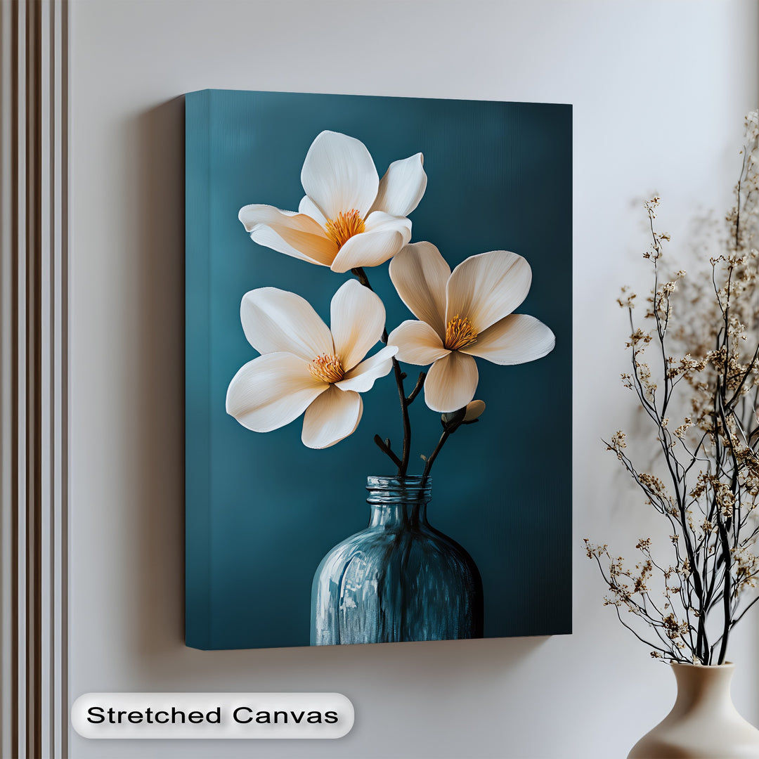 White Magnolia Trio – elegant flower canvas wall art in teal tones.

