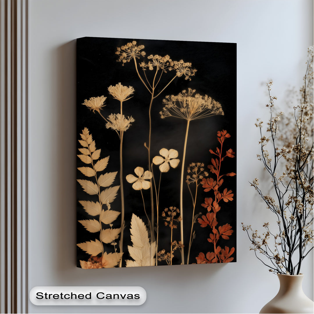 Golden-hued organic forms of botanical silhouettes create a striking contrast on this elegant, dark floral nature big canvas prints wall art.