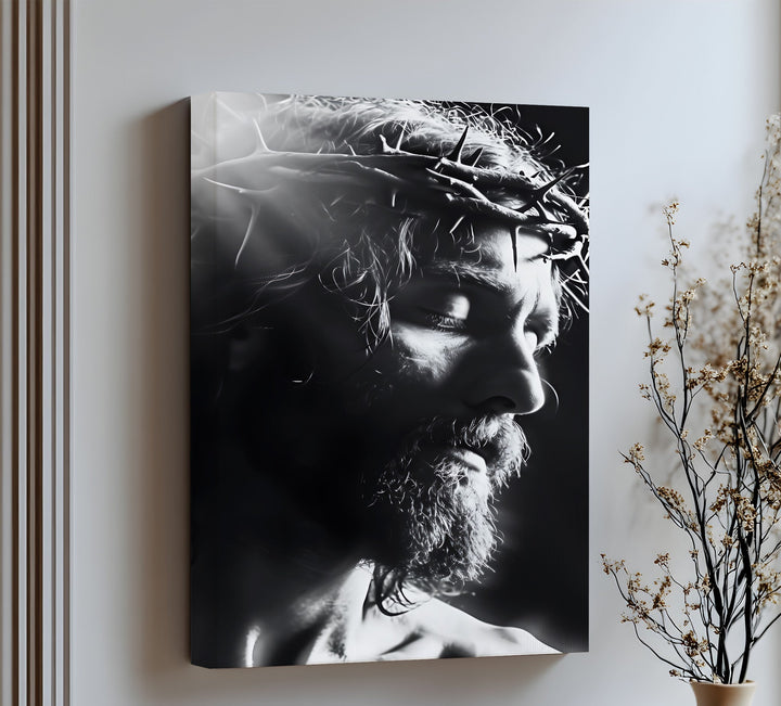 Experience solemn reverence with this emotional canvas wall art of Christ in silent reflection.

