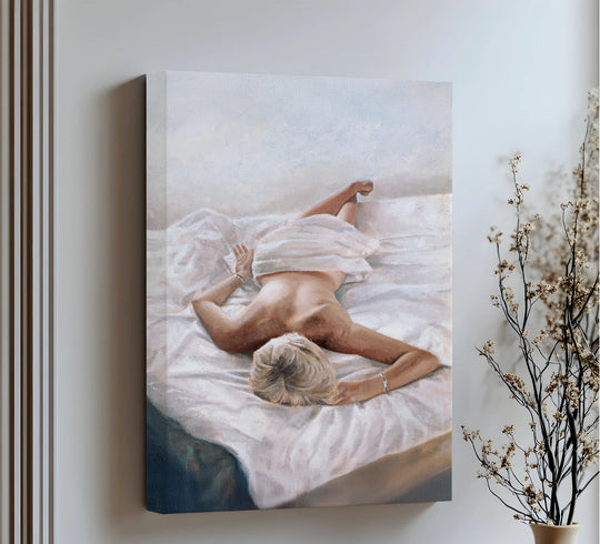 Low color saturation enhances the serene mood of this 'Quiet Morning' canvas artwork, featuring a reclining nude figure in soft white sheets.
