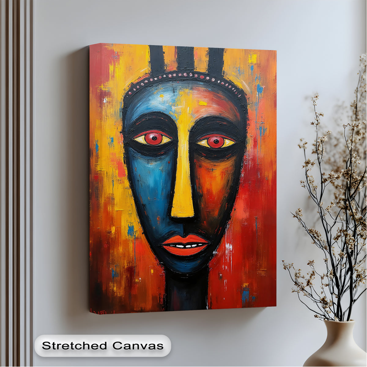 Dramatic color contrast defines this abstract African tribal face modern canvas wall art, showcasing bold hues of blue, red, and yellow.