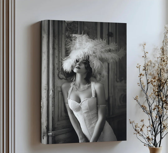 Cool tones dominate this feathered elegance vintage-inspired female portrait canvas wall art, accentuating the timeless glamour of the black-and-white canvas print.