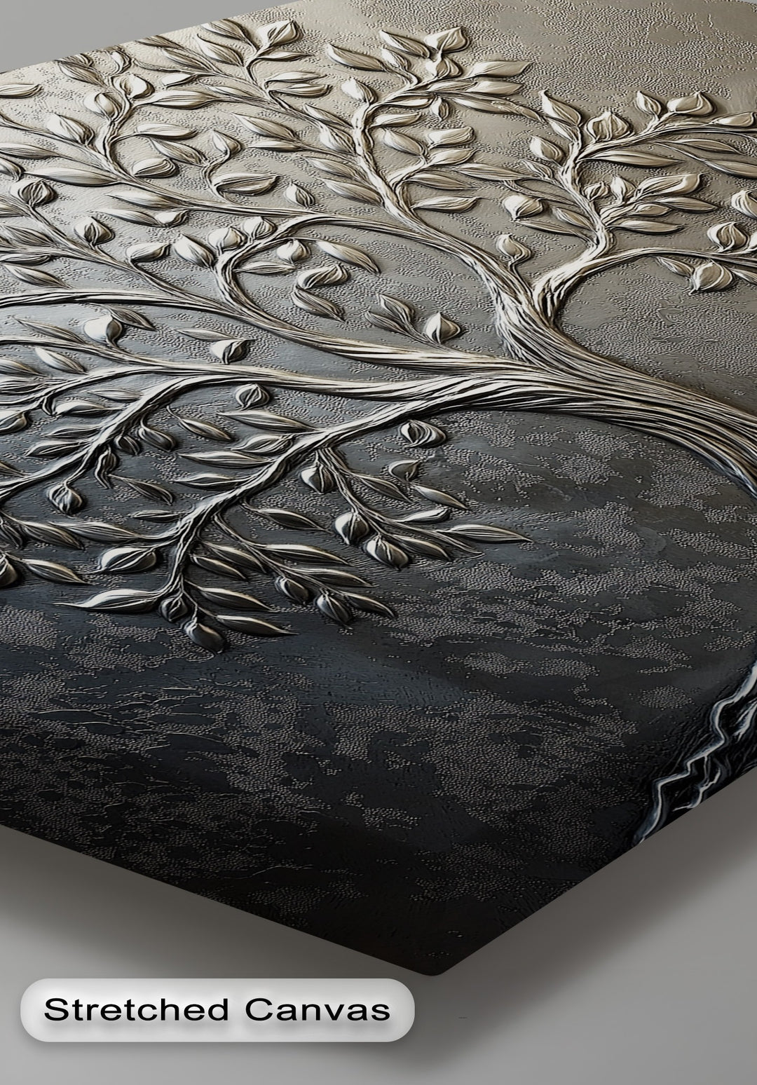 Light and shadow dramatically emphasize the sculpted silver tree's branches and leaves on this dark, textured, elegant botanical framed canvas.