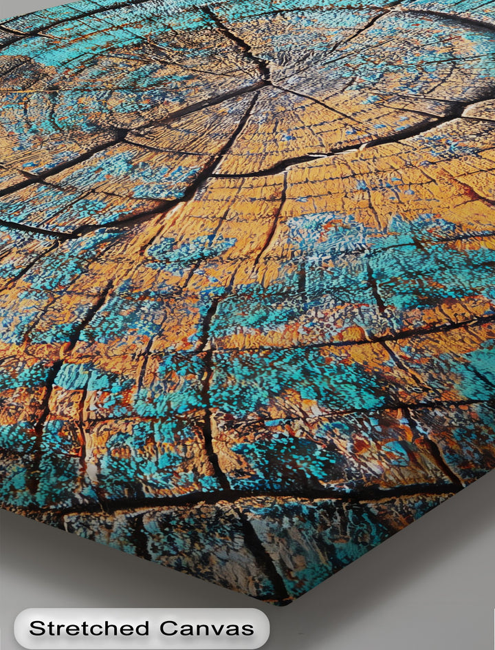 Revealing depth and layers, the turquoise tree rings abstract wood pattern creates the illusion of dimension within this framed canvas wall art print.