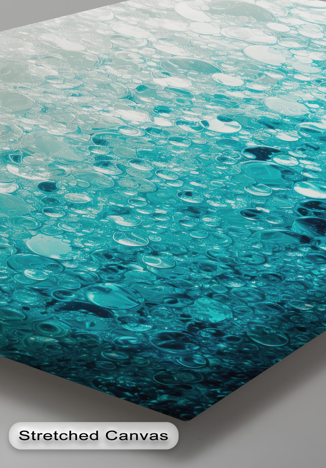 An abstract hanging canvas showing a captivating color transition from light turquoise to deep aqua, filled with shimmering bubble texture details.