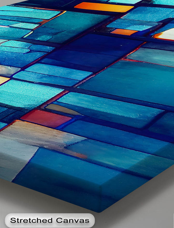 Deep shadows contrast with shimmering light on this blue mosaic stained glass abstract premium canvas decor, enhancing its textured blocks.