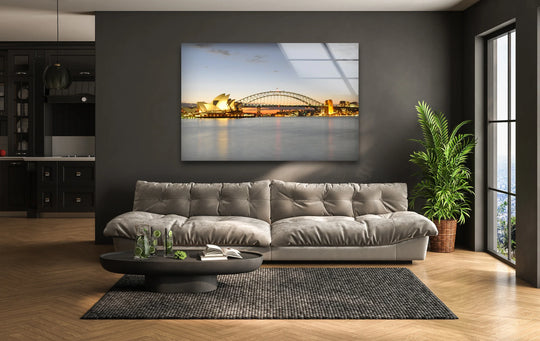 Reflecting on the water, the Sydney Harbor Bridge seems to ripple with motion in this best glass art, adding life and a sense of movement to the serene city print.