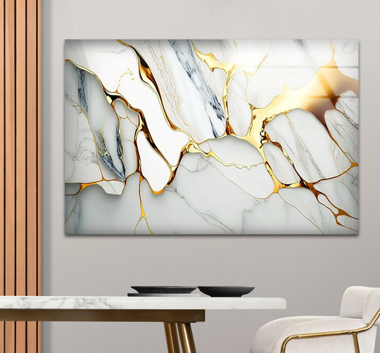 White marble abstract glass wall art featuring dominant gold accents, the best glass art for modern luxury.