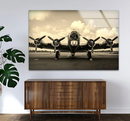 Sepia-toned vintage warplane tempered glass wall art with high contrast between the dark aircraft and light sky.