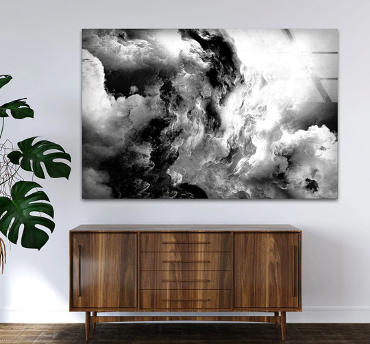 A dark wood sideboard with drawers displays abstract monochrome storm glass wall art, a unique modern wall decor.