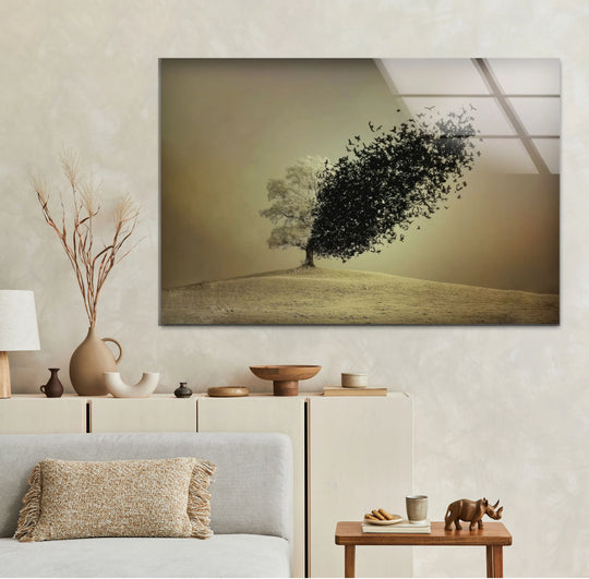 Depicting a color transition from white to black as the tree's leaves transform into birds, this nature-inspired surreal minimalist art showcases the best glass art.