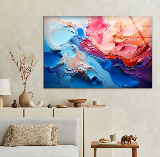 Vibrant abstract hanging wall art showcases highly saturated swirling blues, pinks, and fiery oranges in a dynamic and fluid modern design.