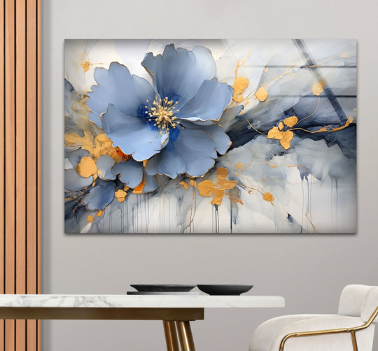Detailed foreground view of a luminous blue blossom with gold accents, part of elegant hanging wall art.