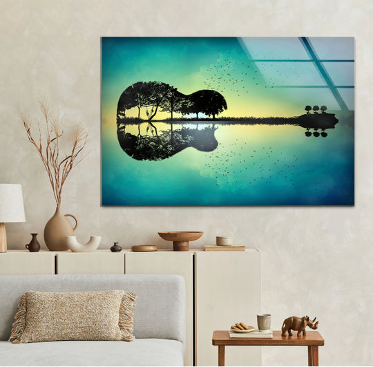 Surreal guitar island glass art painting with trees reflecting in tranquil turquoise water.