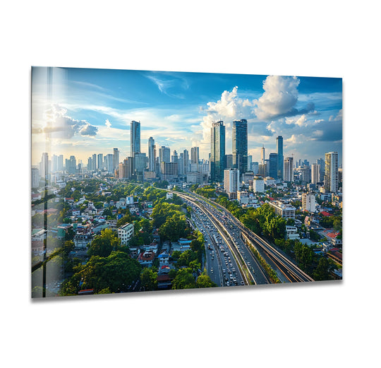 Featuring green and blue hues, this Tropic Bangkok glass wall artwork showcases a cityscape view with a highway and city skyline.