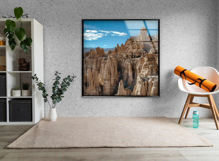 Earth-toned landscape glass print featuring intricate desert rock textures.
