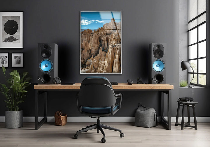 8K glass print of towering rock spires in a dramatic desert scene.

