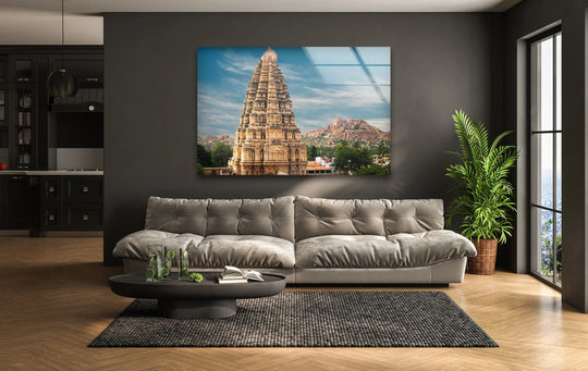 Vivid color contrast defines this print wall art, highlighting the majestic Virupaksha Temple against a deep gray wall in this architectural glass art scene.
