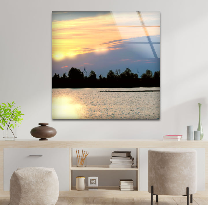 Sunset Lake View Wall Art – Serene Wind Turbine Glass Print for Eco-Inspired and Modern Interiors
