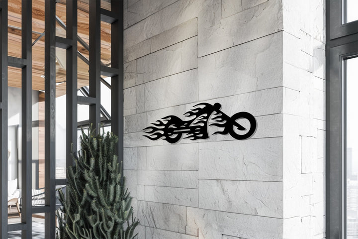 Surface texture of the decorative metal art emphasizes the rugged, stylized flames of the motorcycle wall decor.