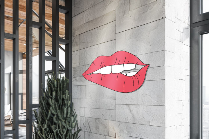 Minimalist red lips metal sculpture with elegant detail