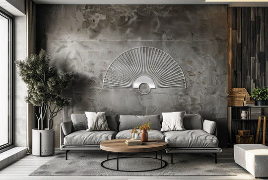 Rising sun fan, minimalist Japanese-inspired metal wall art, a unique piece of metal wall decor, is the central subject on the textured grey wall.